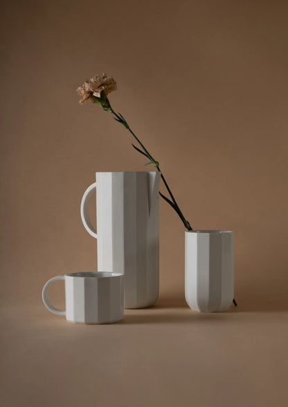 Becher Facet